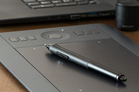 Stylus Pen on Gray Digitizer Tablet 